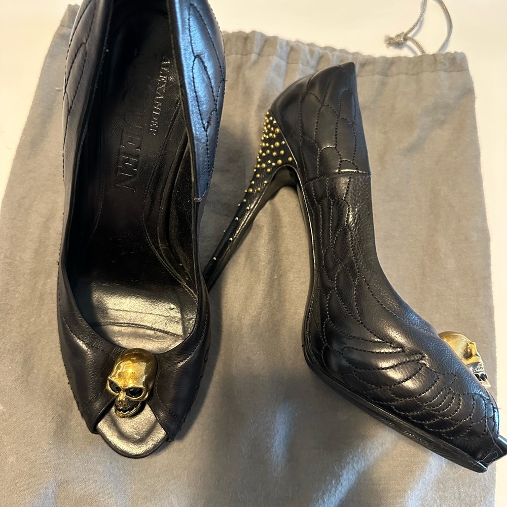 Alexander McQueen Black and Gold Heels with Gold Skill and angel wing pattern